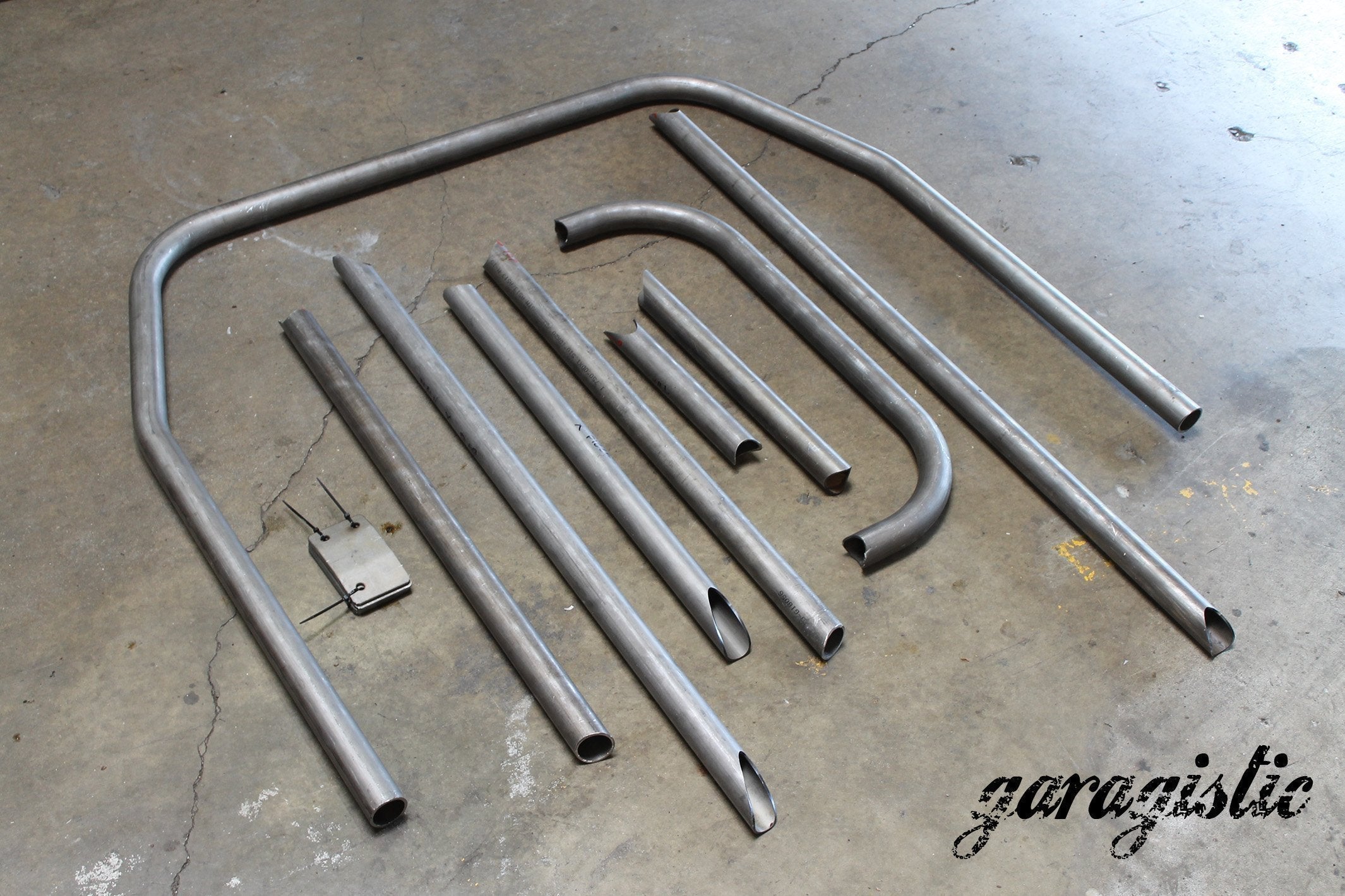 E30 Coupe and Sedan Weld-it-Yourself Roll Bar-Roll bars-No rear bracing-Straight harness bar-Bent (makes room for rear bench seat)-Garagistic